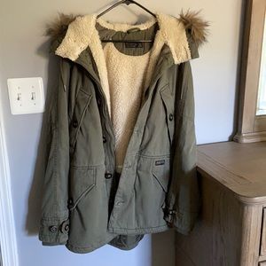 Olive Green coat with sherpa interior and fur lined hood
